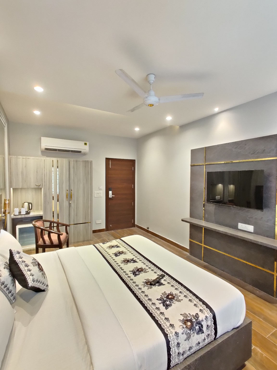 Narison Hotel bedroom with television wall